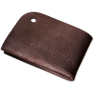 Hultafors Forsberg Trekker's little helper. A brown leather pad with a stamped Hultafors Logo, and holes in two corners for supplied leather cord.