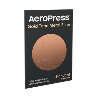 Aeropress reusable metal filter discs. Super Fine discs of Titanium coated stainless steel with a gold colour. 
