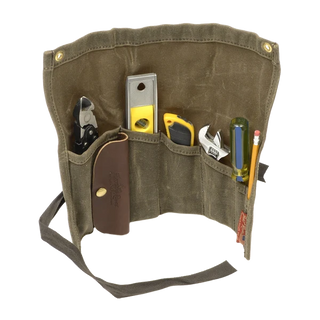 Frost River waxed canvas and leather tool roll with brass fittings and a cotton strap, shown here loaded with some of the tools you might want to use it for!