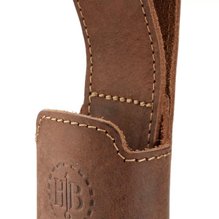A Hults Bruk Brown leather axe holster or loop, worn on the belt to carry an axe. Shown here with a stamped HB logo, and complimenting stiching. 