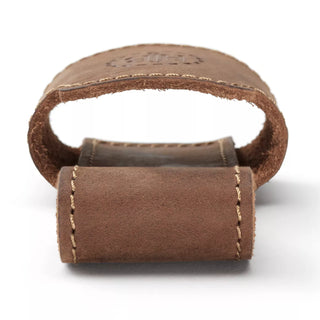 A Hults Bruk Brown leather axe holster or loop, worn on the belt to carry an axe. Shown here with a stamped HB logo, and complimenting stiching. 