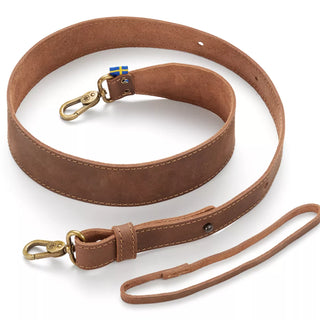 Hults Bruk Leather Axe Sling - a brown leather sling with brass clips and a Swedish flag label.