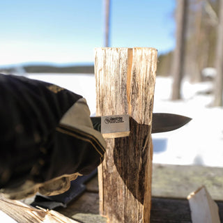 Casstrom No.14 Swedish Forest Knife with a green Micarta handle, splitting some timber with ease.