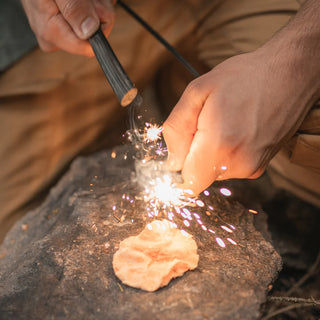 Pathfinder branded Ferrocerium rod for striking sparks to light fires. 6" alloy rod with a Tungsten scraper.