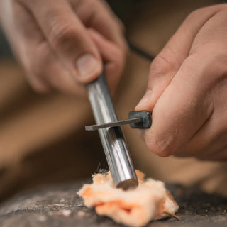 Pathfinder branded Ferrocerium rod for striking sparks to light fires. 6" alloy rod with a Tungsten scraper.