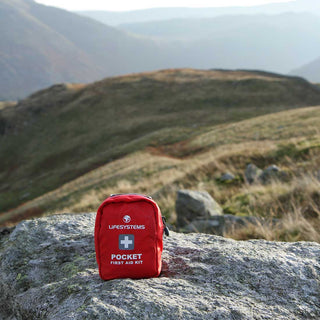 LifeSystems Pocket First Aid kit - a red pouch containing some basic first aid supplies