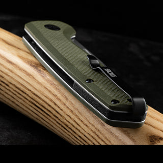 SOG Terminus Slip Joint knife, D2 steel blade with a green G10 handle, a reliable workhorse of a knife that looks the part too