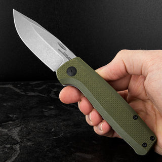 SOG Terminus Slip Joint knife, D2 steel blade with a green G10 handle, a reliable workhorse of a knife that looks the part too