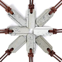Wazoo Gear Viking Whetstone pendant necklace, natural Arkansas stone, on a leather cord, showing the Uncommon colours.