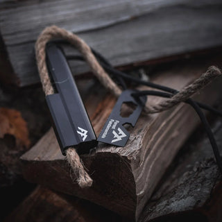 Forest Fundamentals Stealth Firelighter, a ferrocerium rod, in an aluminium holder, with fire lighting cord, striker, and lanyard. 